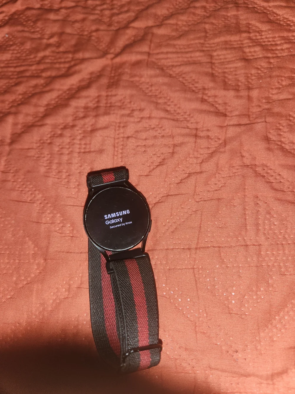 Samsung Galaxy Smartwatch 6 Classic with Black and Red Nylon Strap